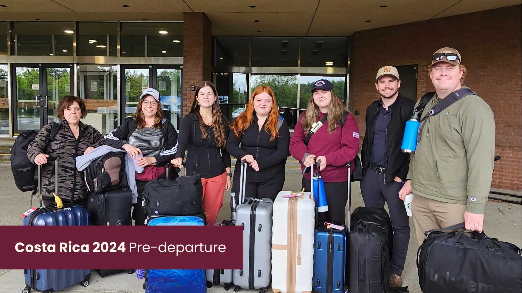 Seven students stand outside a building with luggage, preparing for a trip. A banner reads "Costa Rica 2024 Pre-departure," highlighting the Cambrian College Global Skills Opportunity program.