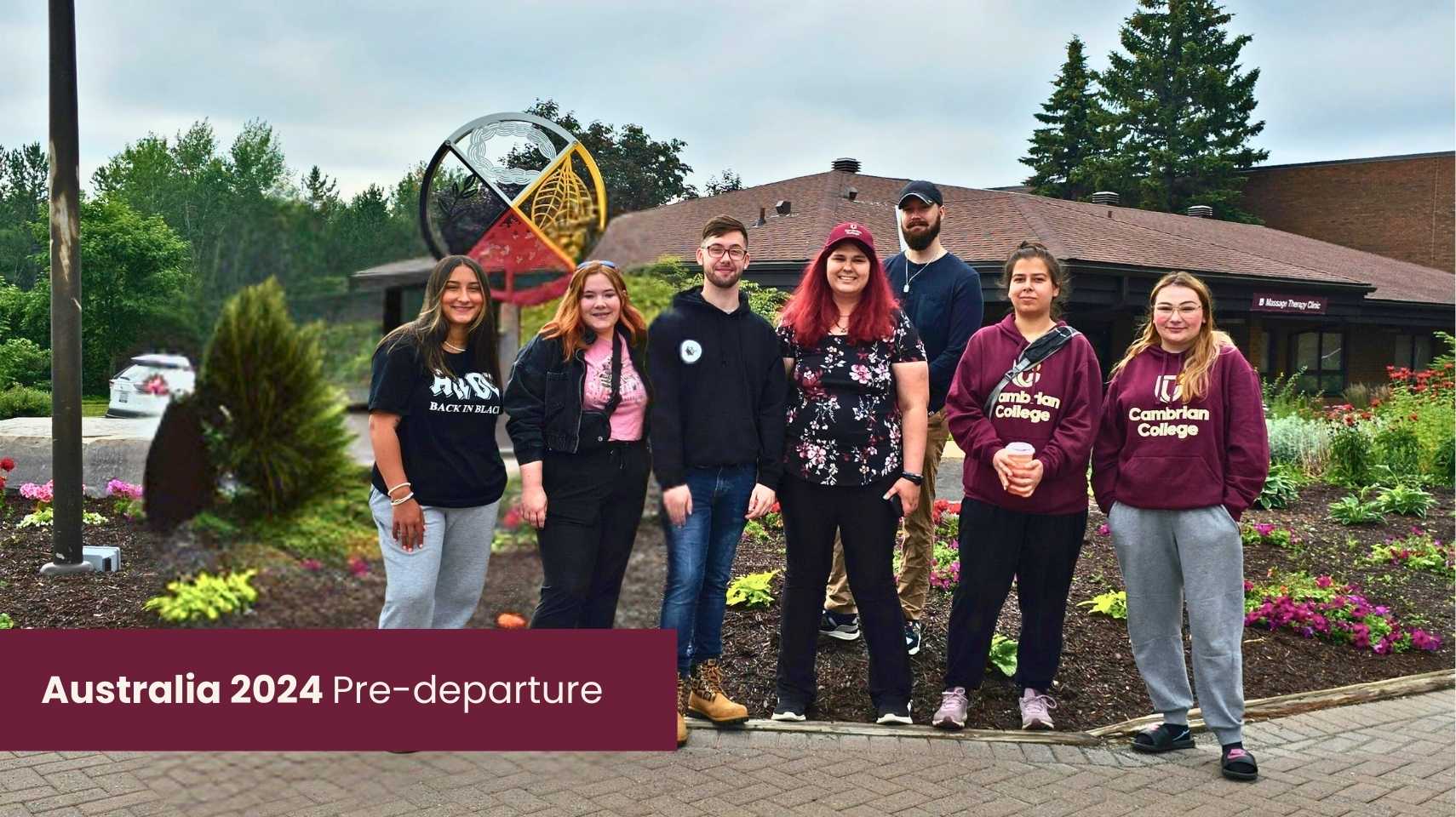 Seven students stand together outside a building with a garden, some wearing Cambrian College attire. Text reads: "Australia 2024 Pre-departure." This group is ready for their Cambrian College Global Skills Opportunity adventure.