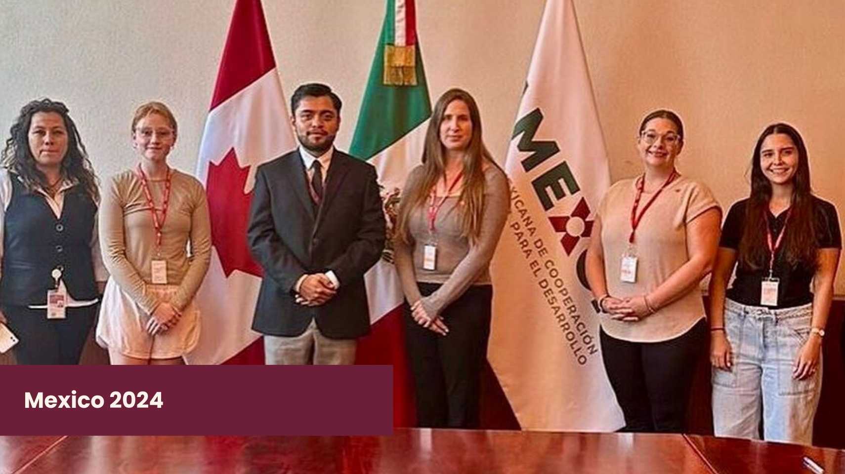 Six students stand in front of Canadian and Mexican flags at a formal event, wearing business attire and Cambrian College Global Skills Opportunity badges. Text reads "Mexico 2024.